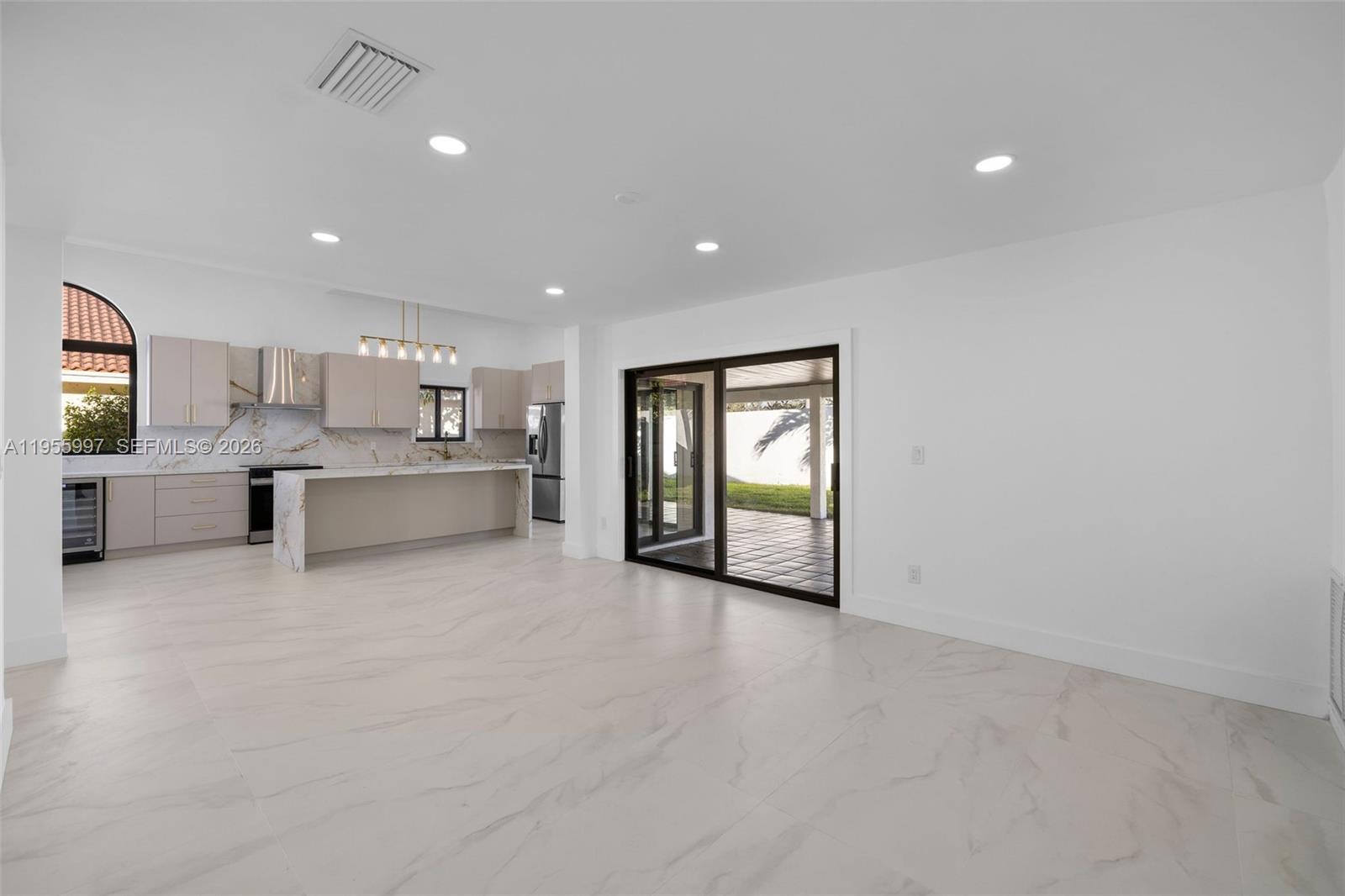 11260 Southwest 157th Court Miami, FL 33196 - Photo 11 of 29 a view of a kitchen with a sink and dishwasher cabinets