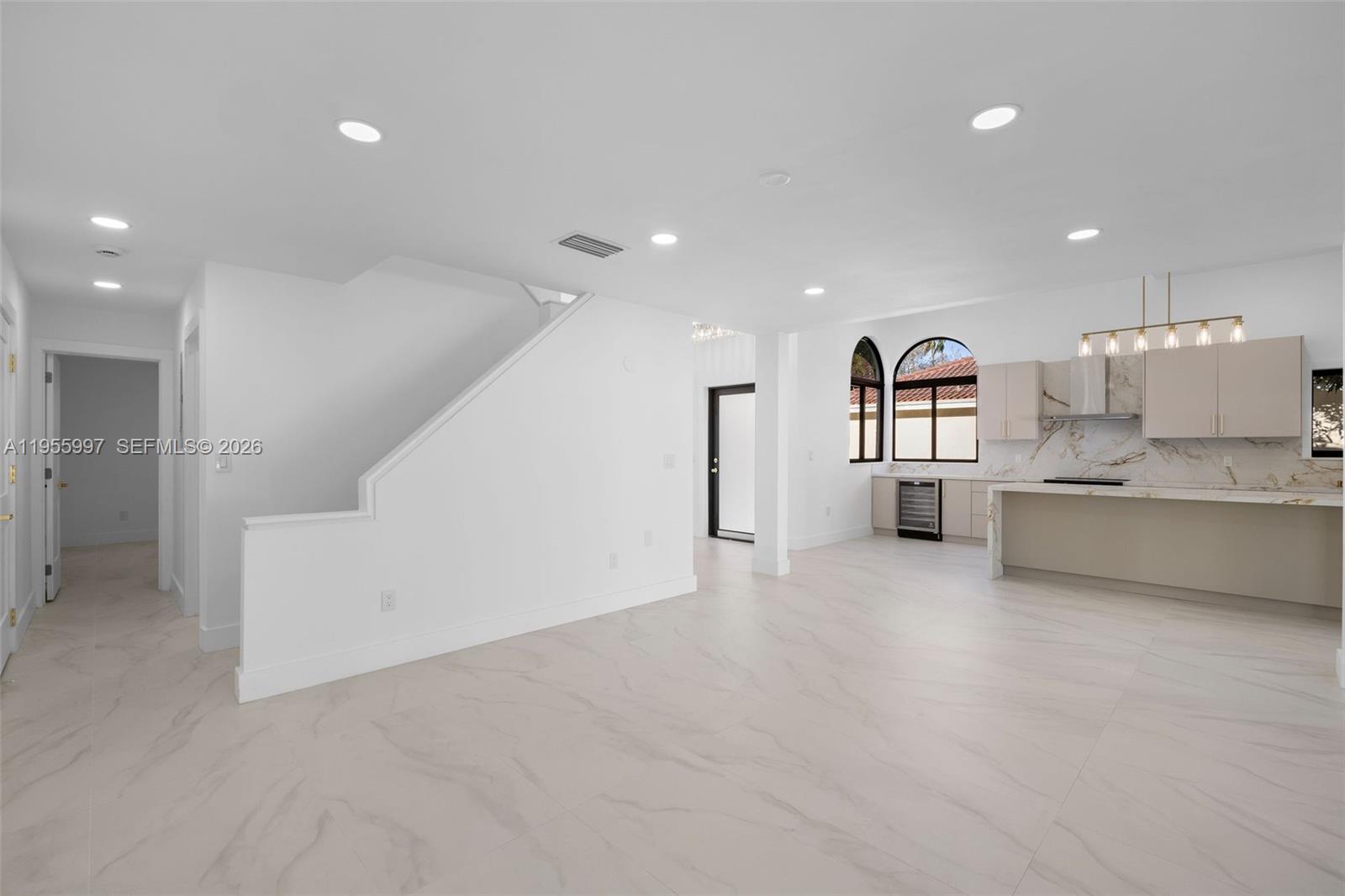 11260 Southwest 157th Court Miami, FL 33196 - Photo 12 of 29 a view of a kitchen with a sink and cabinets