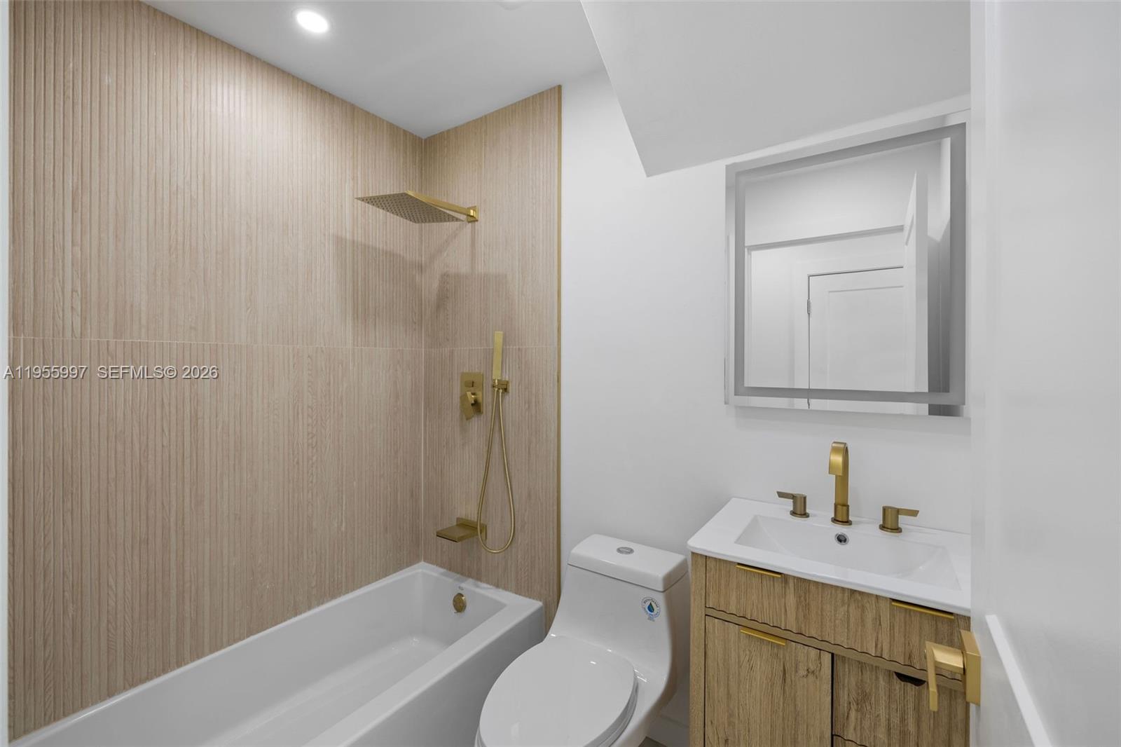 11260 Southwest 157th Court Miami, FL 33196 - Photo 13 of 29 a bathroom with a sink a toilet and shower