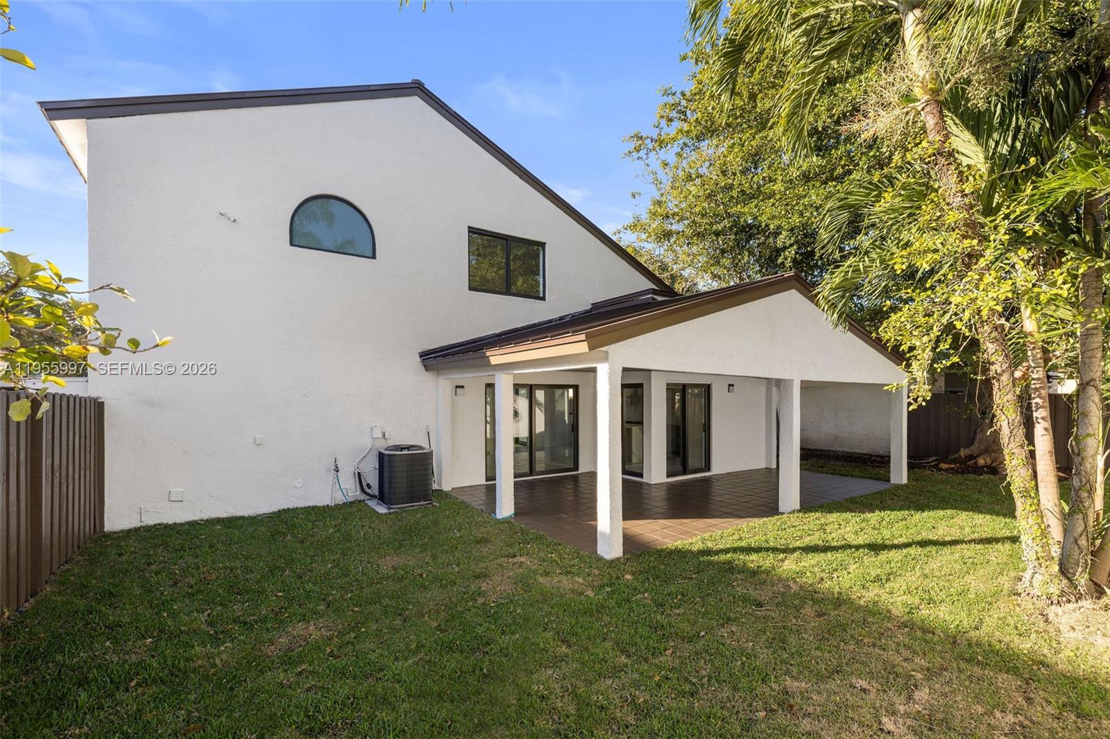 11260 Southwest 157th Court Miami, FL 33196 - Photo 29 of 29 a view of a house with a yard