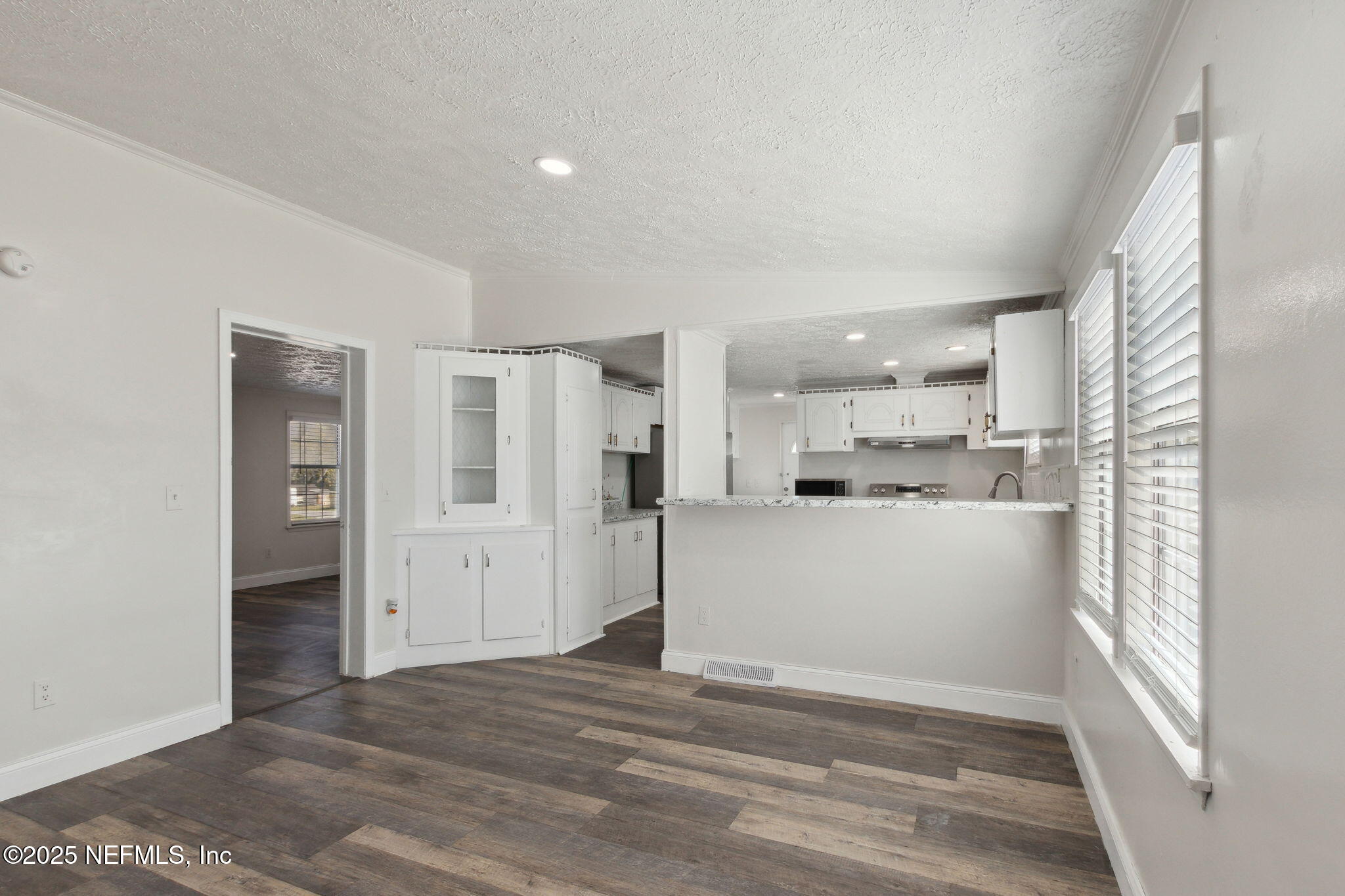 97119 Diamond Street Yulee, FL 32097 - Photo 14 of 42 a view of a kitchen with refrigerator and window