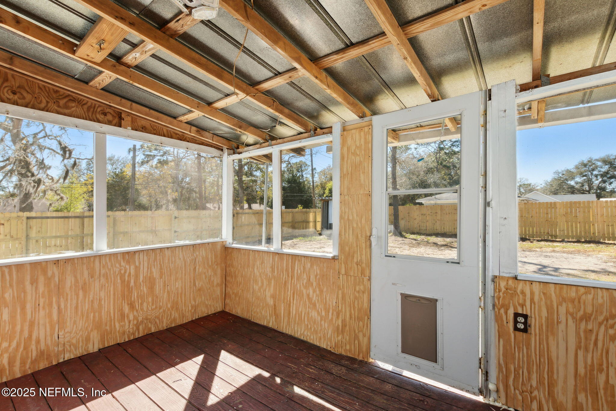 97119 Diamond Street Yulee, FL 32097 - Photo 34 of 42 a view of an empty room with a window