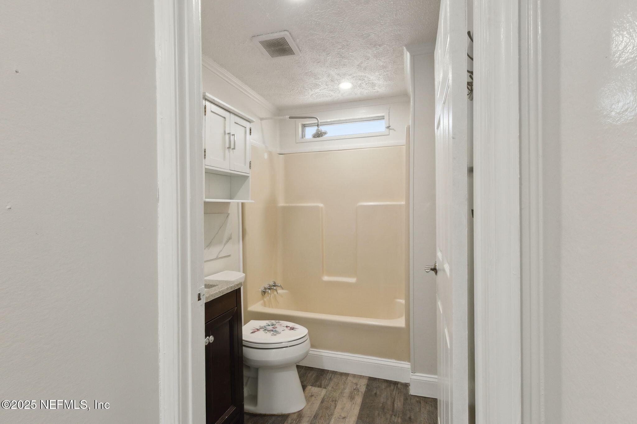 97119 Diamond Street Yulee, FL 32097 - Photo 37 of 42 a bathroom with a toilet and a shower