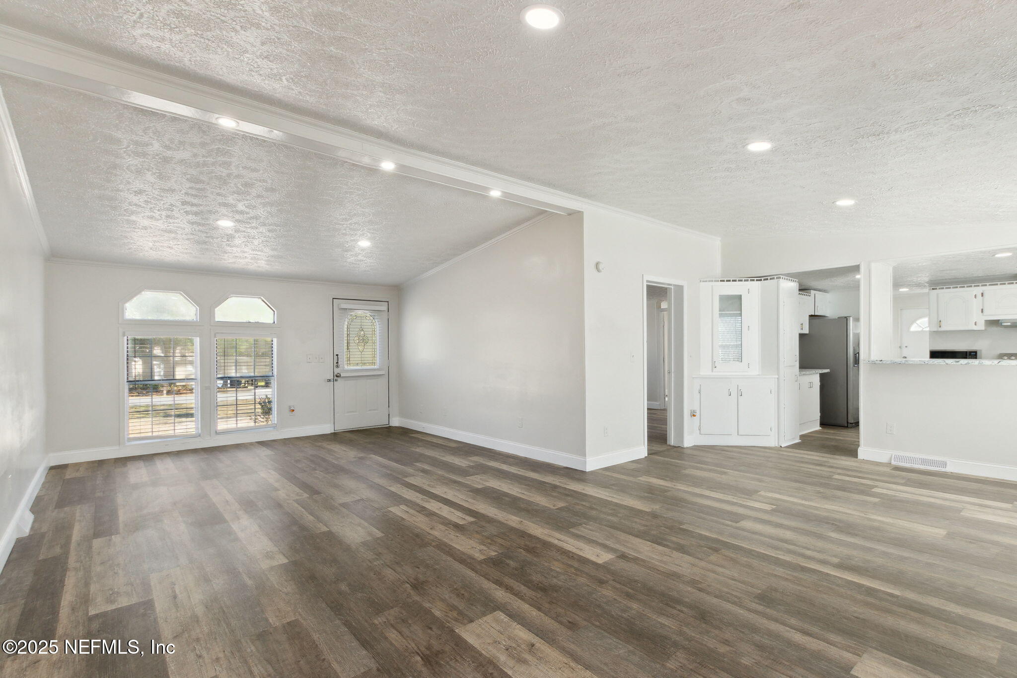 97119 Diamond Street Yulee, FL 32097 - Photo 9 of 42 a view of an empty room with a window