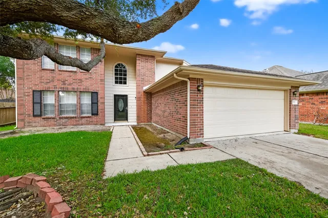 a view of backyard of a house