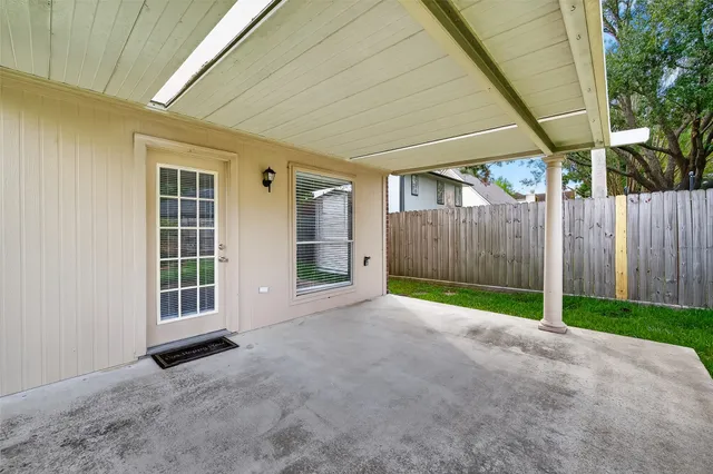 a view of outdoor space and wooden deck