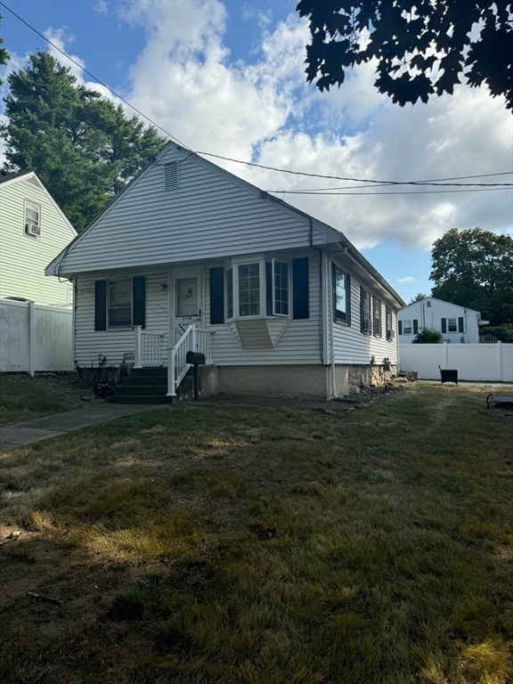 a front view of house with yard