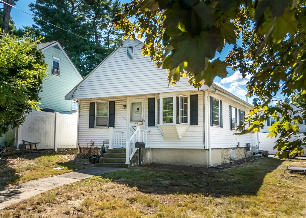 1348 Trapelo Road Waltham, MA 02451 - Photo 4 of 5 a front view of a house with garden