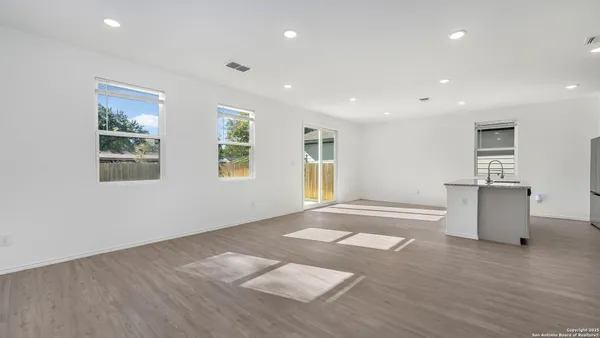 a view of livingroom with furniture and window