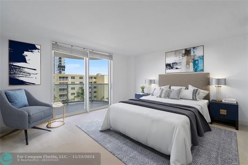 350 South Ocean Boulevard, Unit 5D Boca Raton, FL 33432 - Photo 20 of 35 a spacious bedroom with a bed and a couch