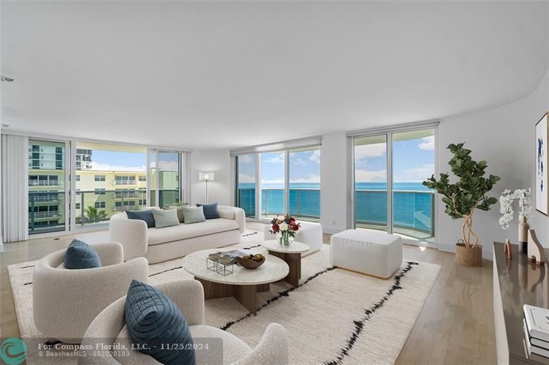 350 South Ocean Boulevard, Unit 5D Boca Raton, FL 33432 - Photo 2 of 35 a living room with furniture and a large window