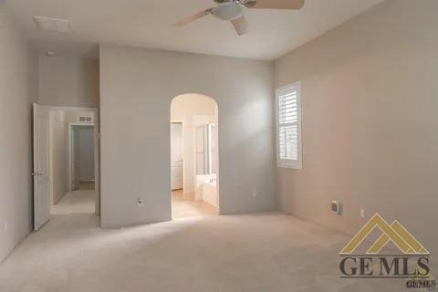 Undisclosed Address Bakersfield, CA 93311 - Photo 15 of 23 an empty room with a empty space and a ceiling fan