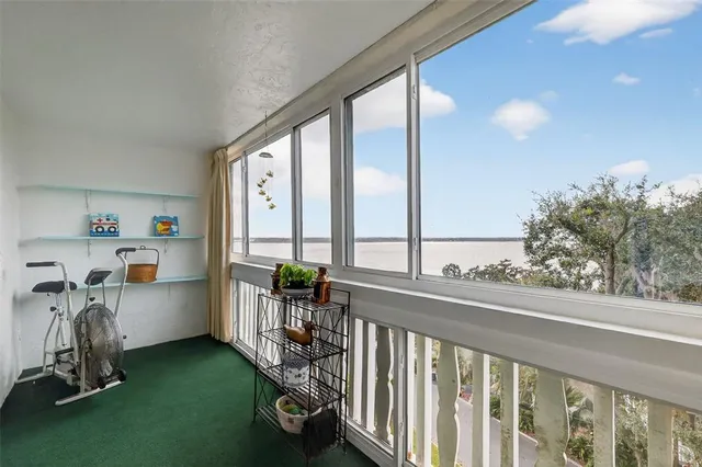a view of a porch with furniture