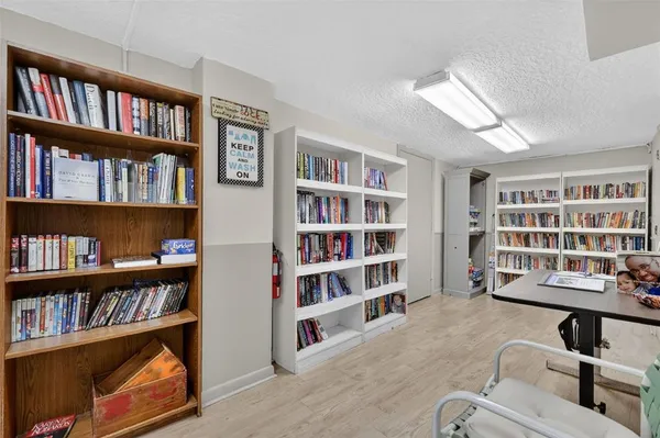 a view of a livingroom with a bookshelf