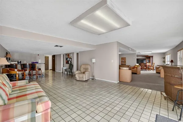 a view of a living room and dining room