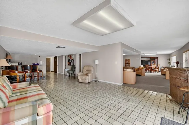 a view of a living room and dining room
