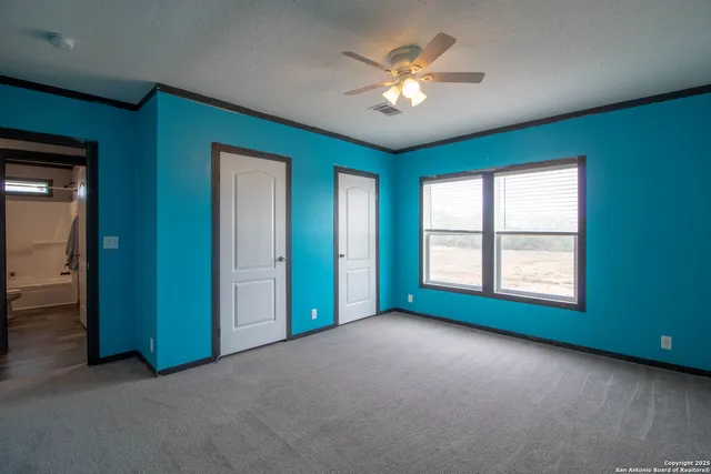 a view of a backyard of a house