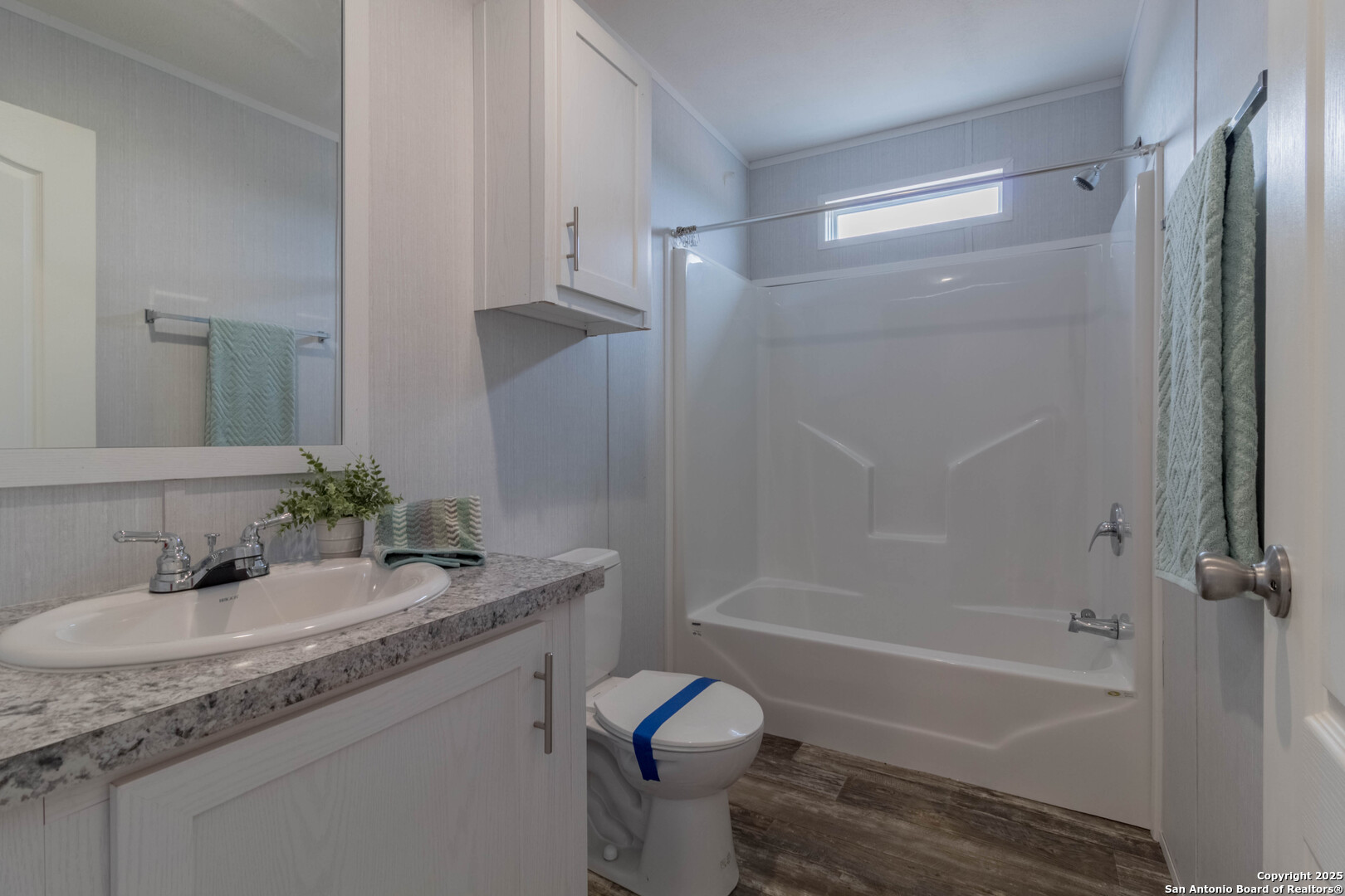 290 Lilly Bear Lane Moore, TX 78057 - Photo 54 of 62 a bathroom with a granite countertop sink toilet and shower