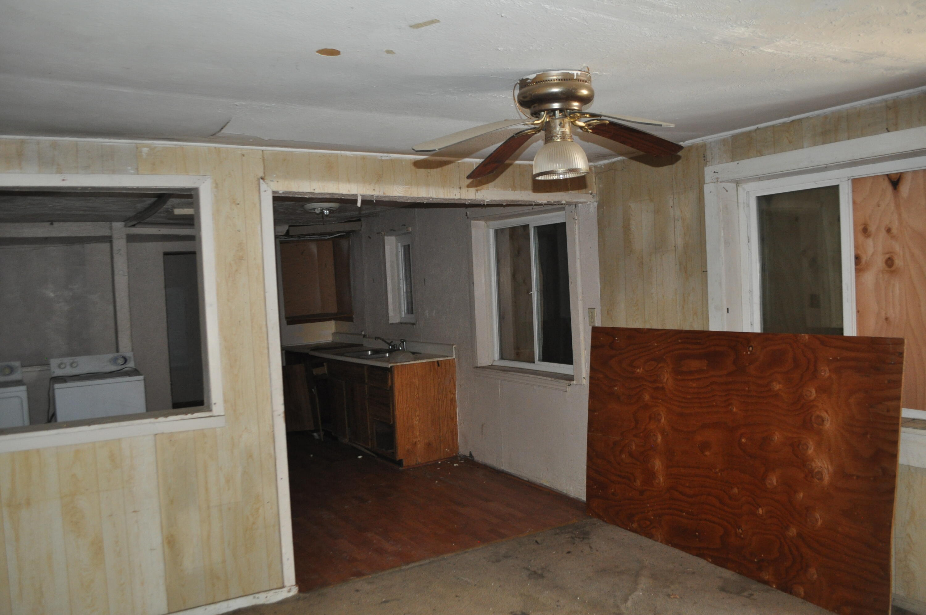 4098 St Patricks Avenue Redding, CA 96003 - Photo 11 of 39 a view of a livingroom with a kitchen