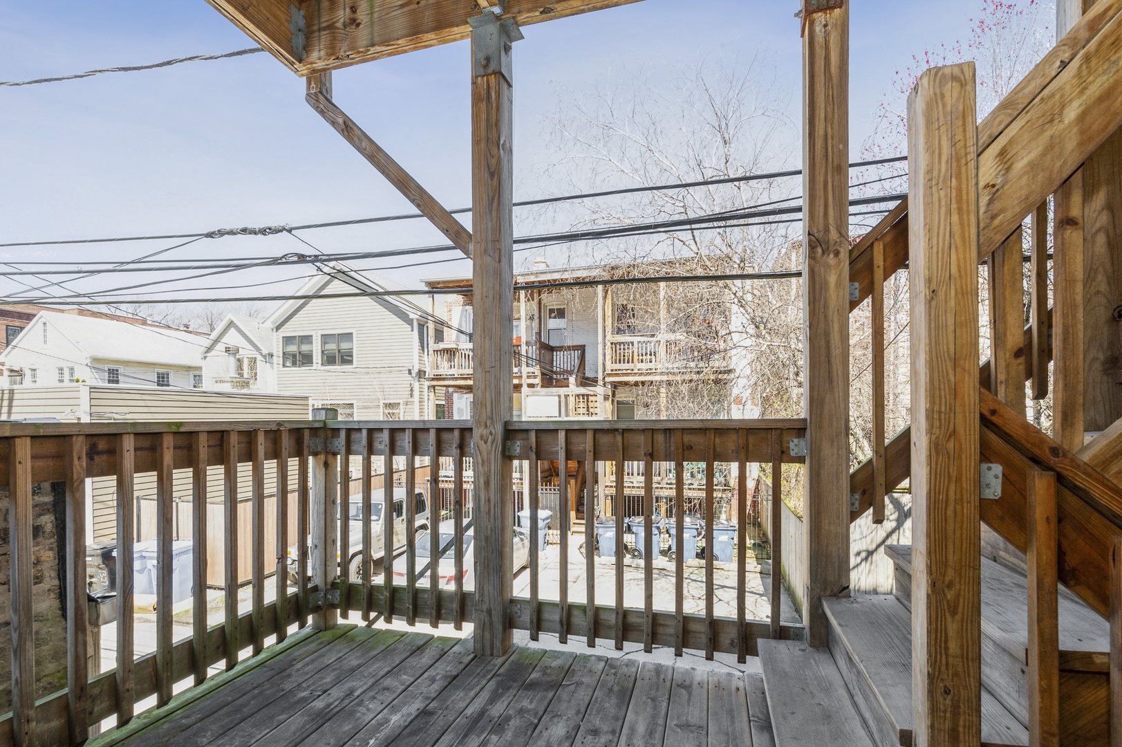 5743 North Ridge Avenue, Unit 1 Chicago, IL 60660 - Photo 11 of 12 a view of a balcony with wooden floor