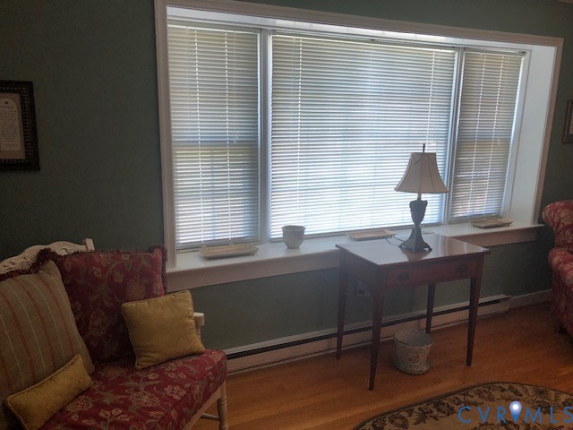 9401 Gum Fork Road Midlothian, VA 23112 - Photo 13 of 28 a living room with furniture and a window