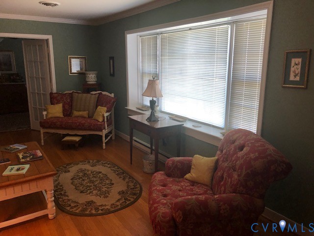 9401 Gum Fork Road Midlothian, VA 23112 - Photo 14 of 28 a living room with furniture and a window