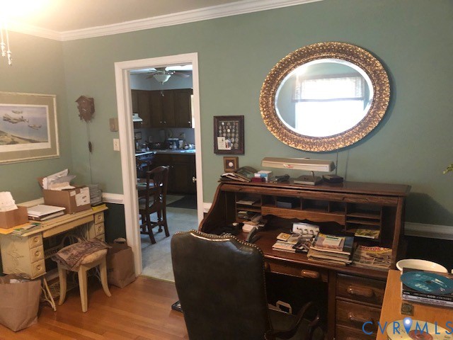 9401 Gum Fork Road Midlothian, VA 23112 - Photo 17 of 28 a living room with a table chairs and a stove top oven