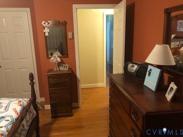 9401 Gum Fork Road Midlothian, VA 23112 - Photo 24 of 28 a bedroom with a bed and a desk