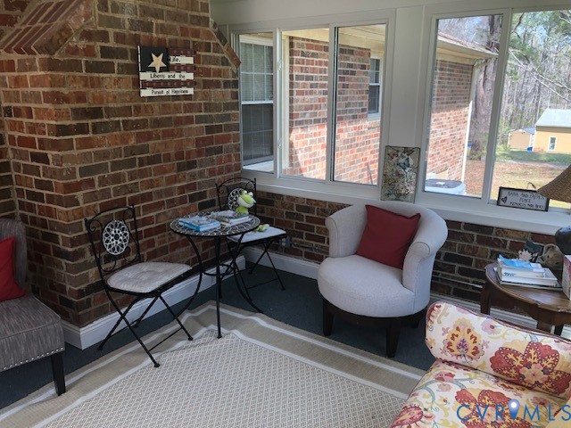 9401 Gum Fork Road Midlothian, VA 23112 - Photo 10 of 28 a living room with furniture and a potted plant