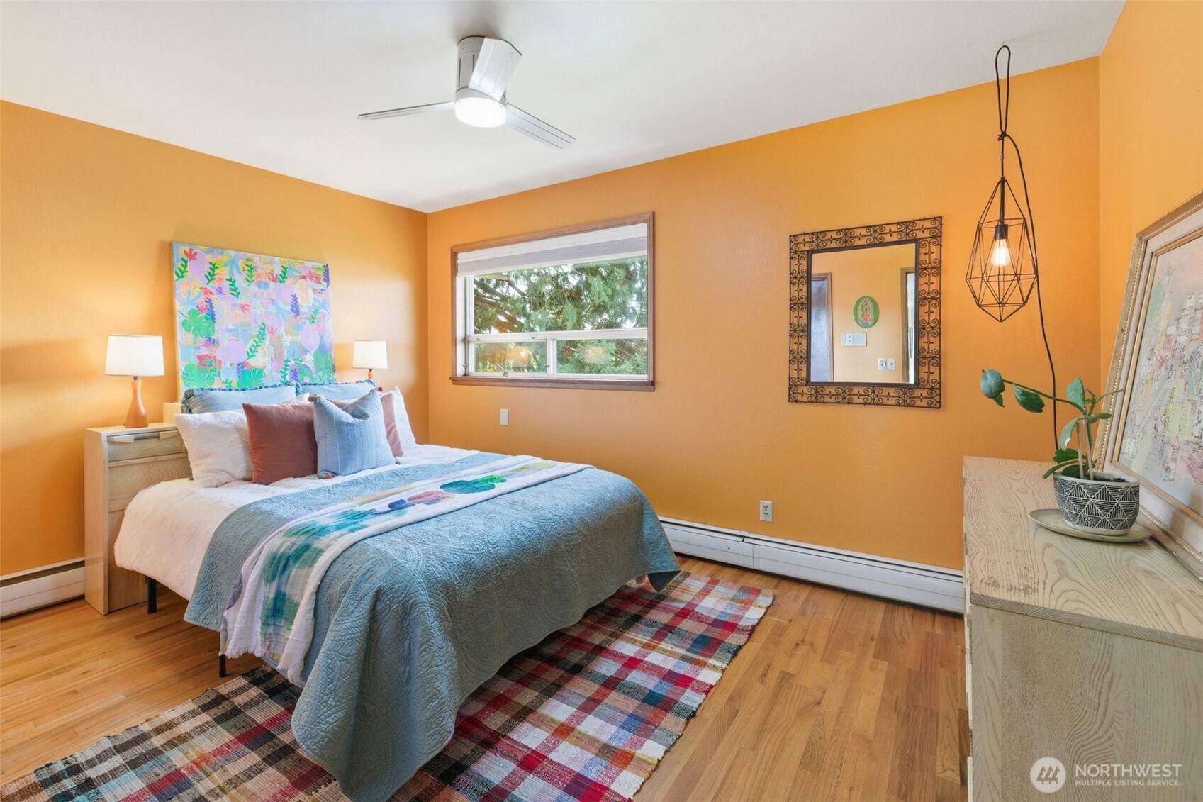 2803 South Walker Street Seattle, WA 98144 - Photo 31 of 40 a bedroom with bed and a window