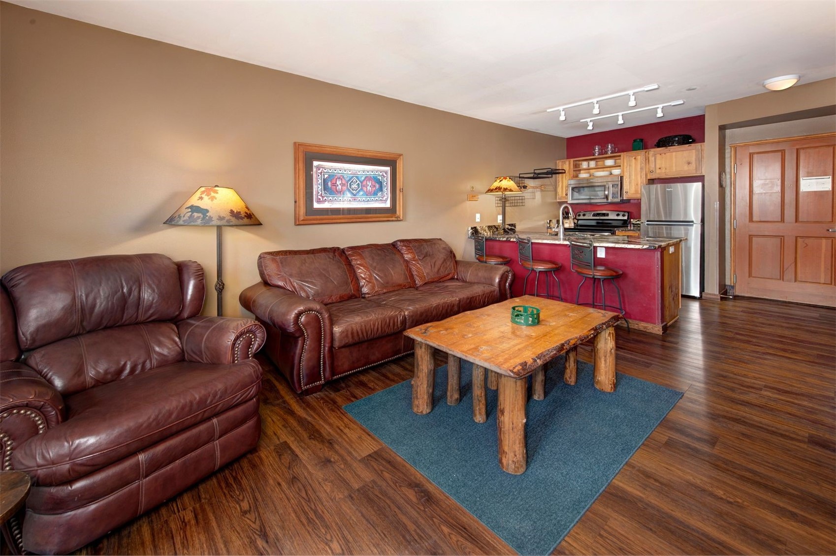 129 River Run Road, Unit 8040 Keystone, CO 80435 - Photo 10 of 50 Living area with dark wood-style flooring