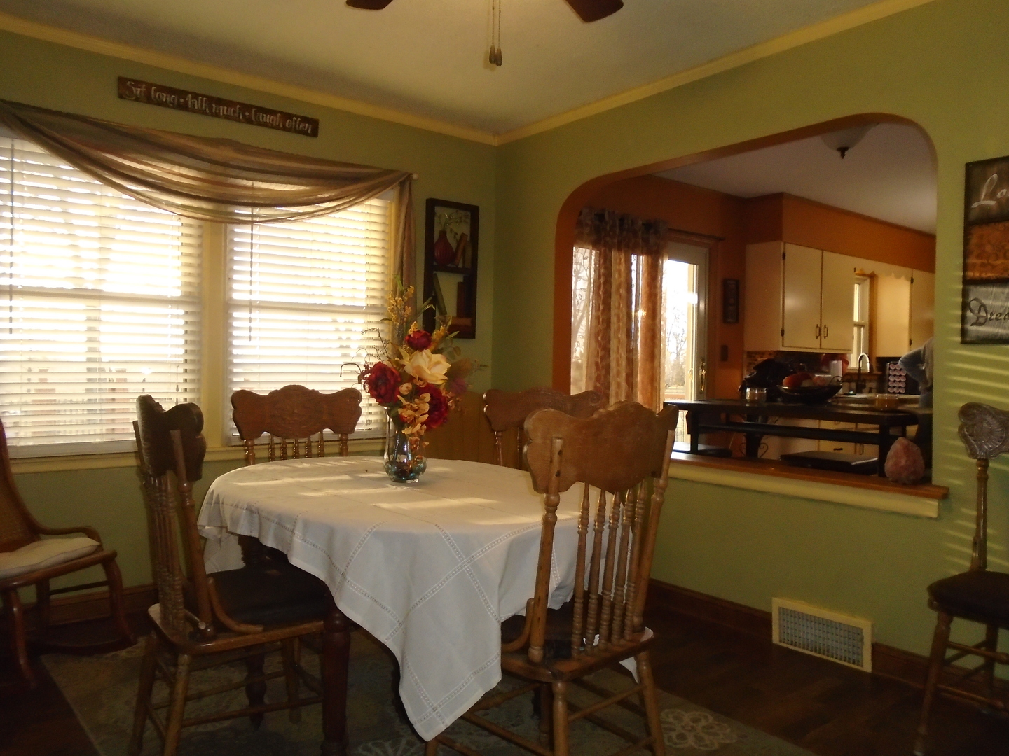 4121 East 2nd Road Mendota, IL 61342 - Photo 2 of 31 a view of a dining room with furniture and windows