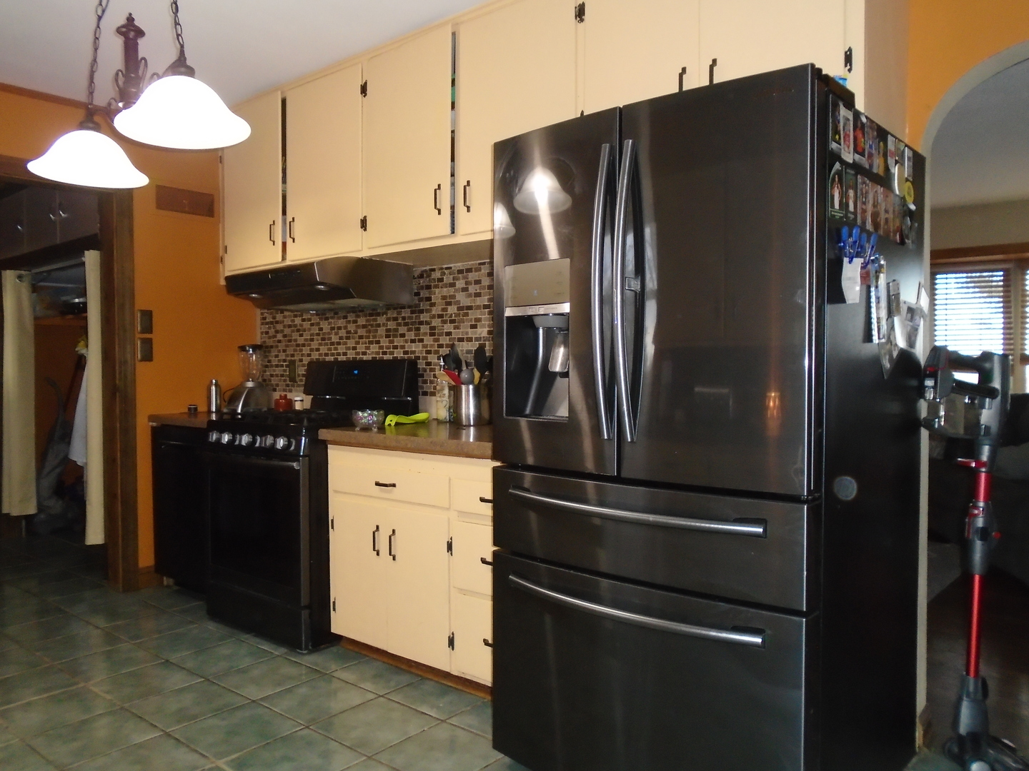 4121 East 2nd Road Mendota, IL 61342 - Photo 11 of 31 a kitchen with stainless steel appliances granite countertop a refrigerator and a stove