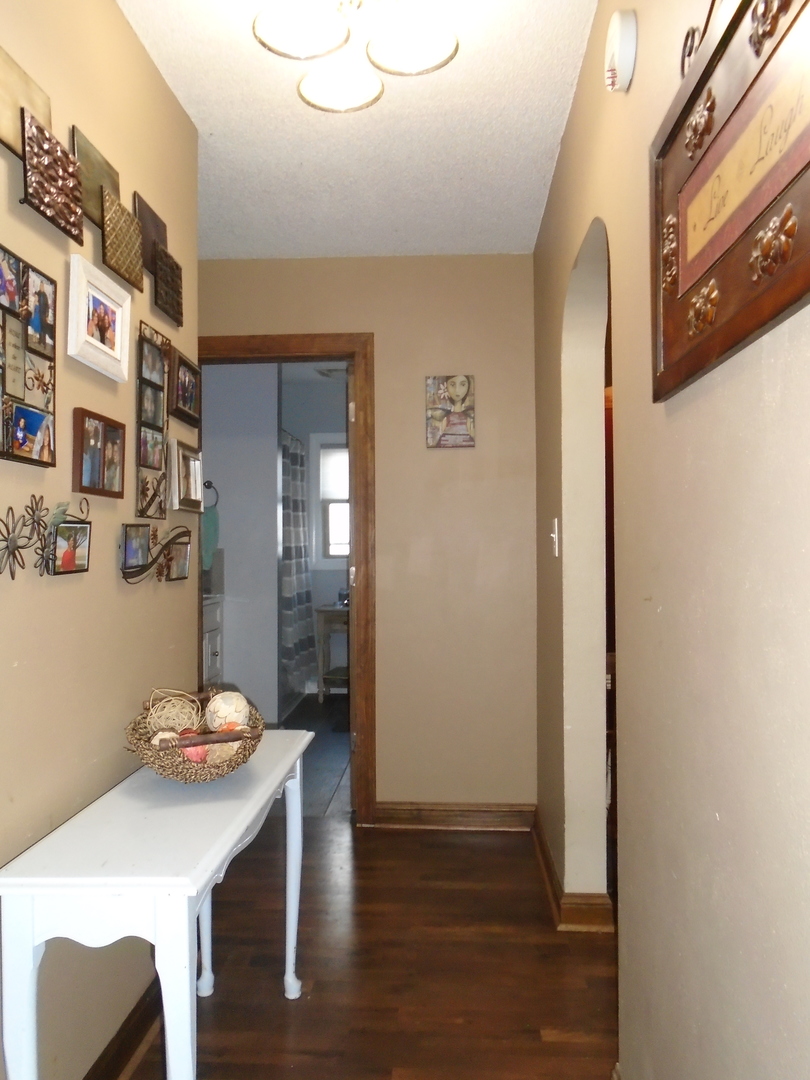 4121 East 2nd Road Mendota, IL 61342 - Photo 18 of 31 a view of a dining room with furniture and wooden floor
