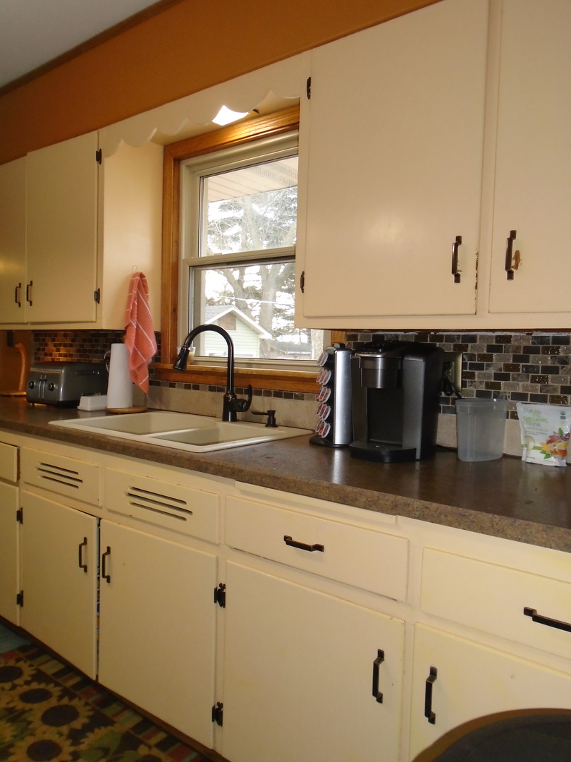 4121 East 2nd Road Mendota, IL 61342 - Photo 10 of 31 a kitchen with sink and window