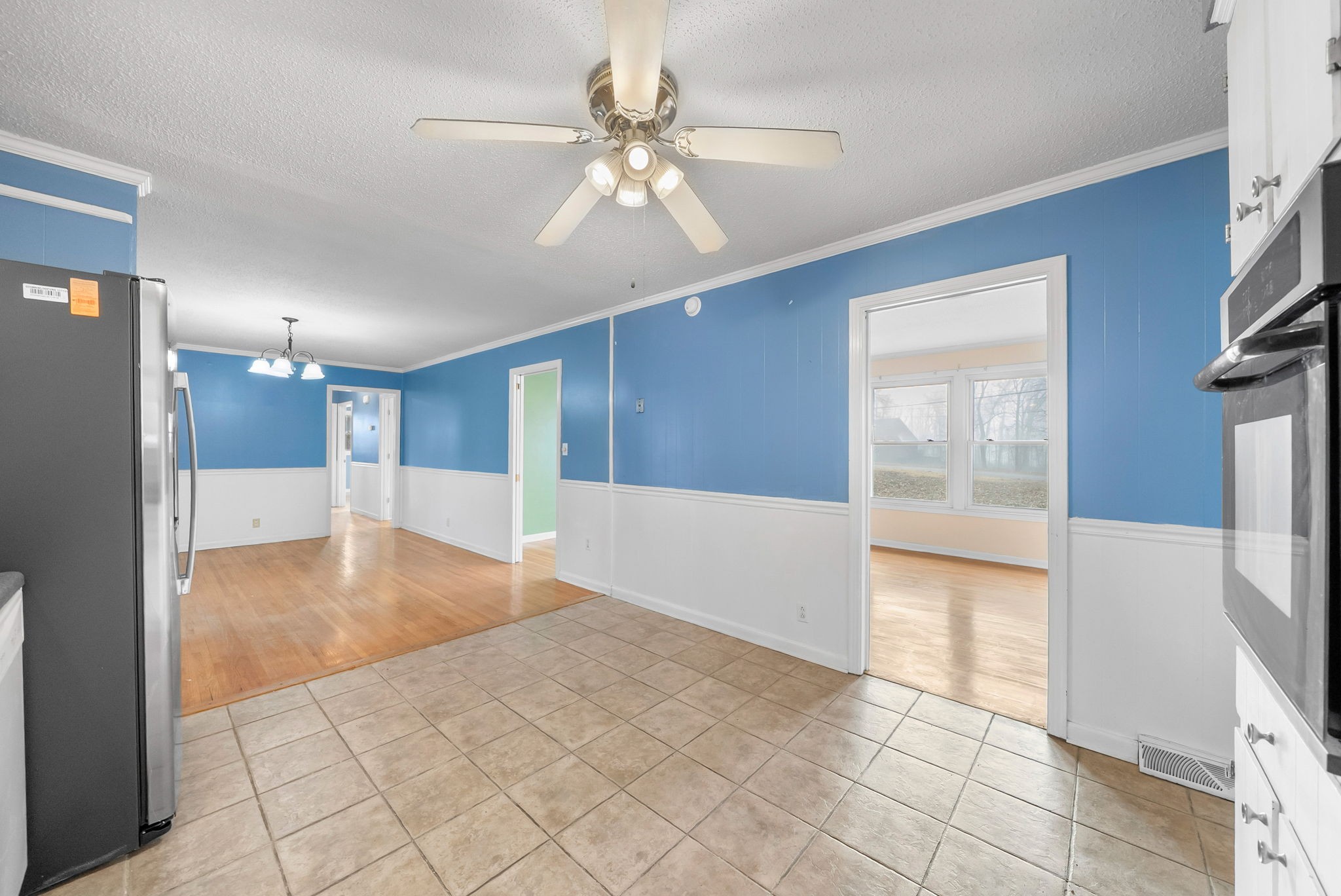 233 Pine Mountain Road Clarksville, TN 37042 - Photo 10 of 33 a view of an empty room with window and chandelier fan