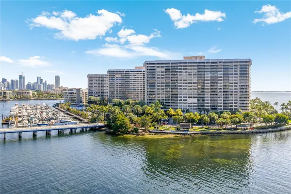 a view of a lake with a nearby beach
