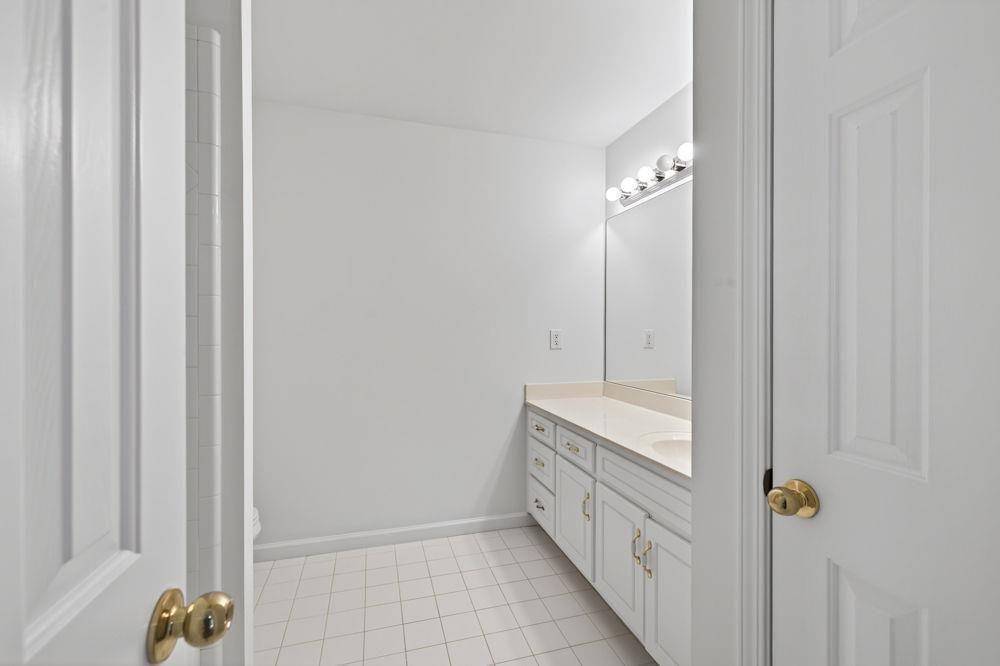 7512 Fieldstone Way Monroe, GA 30656 - Photo 35 of 49 a bathroom with a bathtub and shower