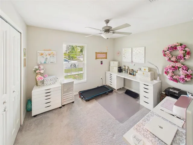a bedroom with furniture and a window
