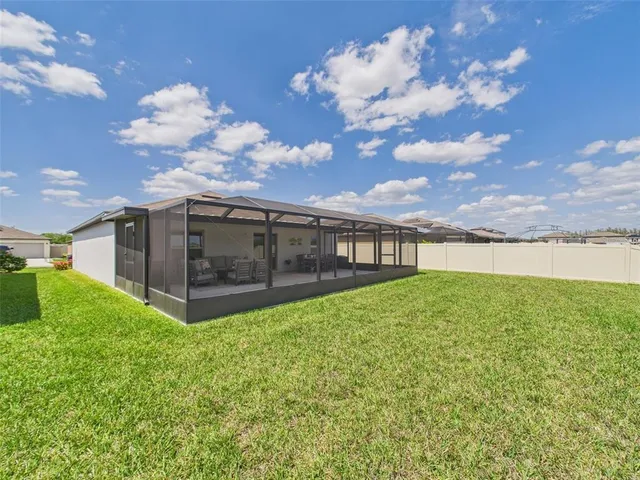 a view of a backyard with garden