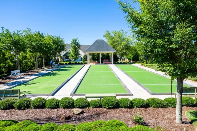 a view of a big yard with swimming pool