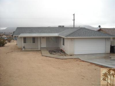 61869 Morningside Road Joshua Tree, CA 92252 - Photo 1 of 5 a house view with a outdoor space