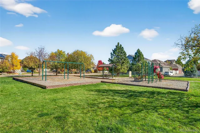 a view of a pathway both side of green field