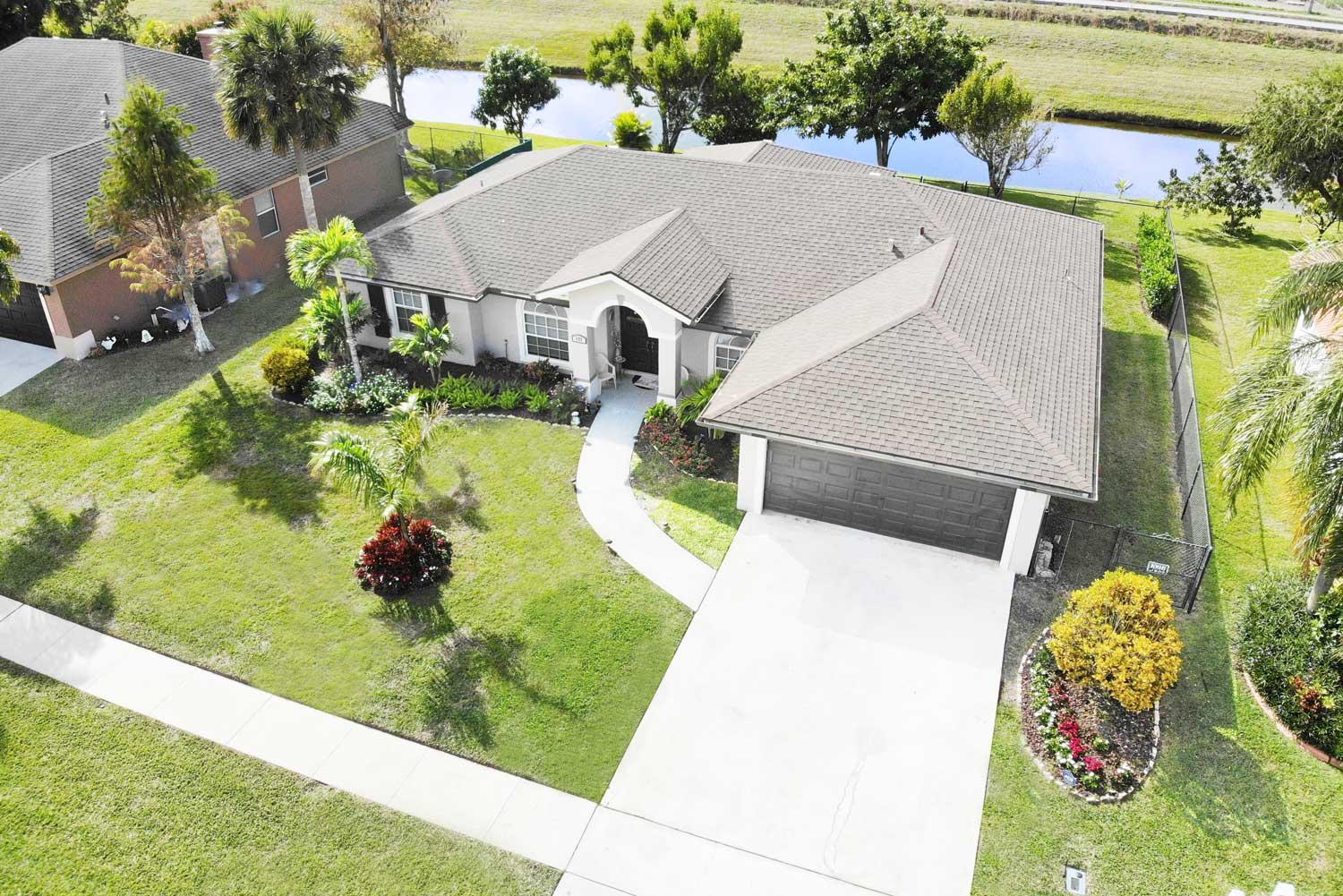 127 Nottingham Road Royal Palm Beach, FL 33411 - Photo 1 of 26 Home For Sale Royal Palm Beach