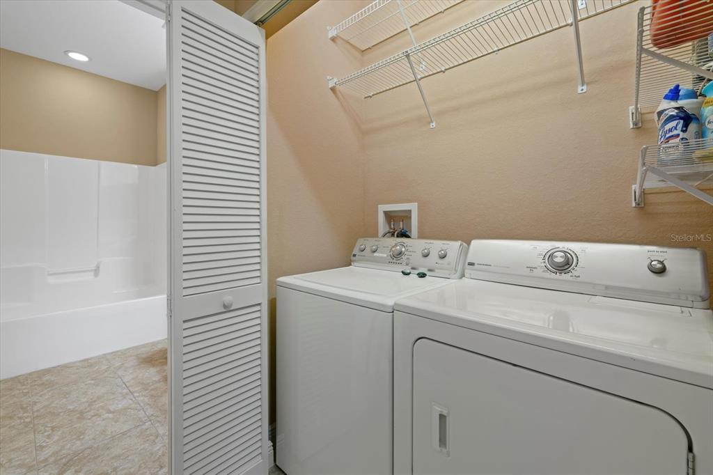 4331 Turnberry Circle North Port, FL 34288 - Photo 19 of 25 a utility room with dryer and washer