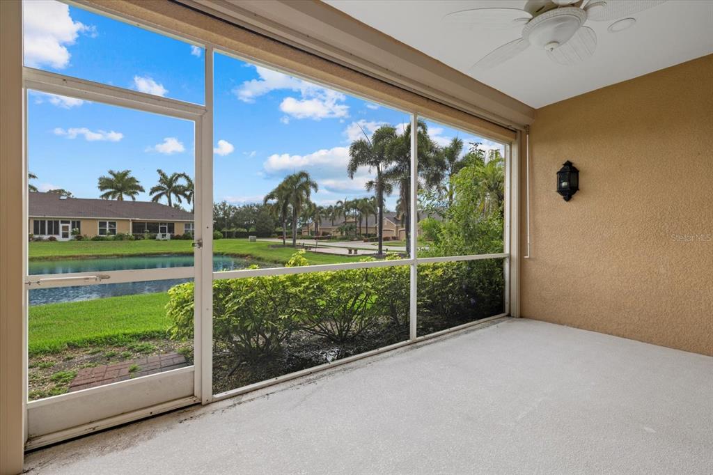 4331 Turnberry Circle North Port, FL 34288 - Photo 21 of 25 a view of a room with porch and wooden floor