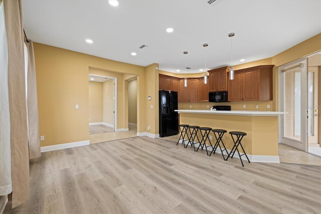 4331 Turnberry Circle North Port, FL 34288 - Photo 9 of 25 a view of a kitchen with a sink and a refrigerator