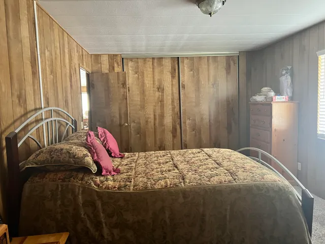 a bathroom with a sink vanity and a mirror