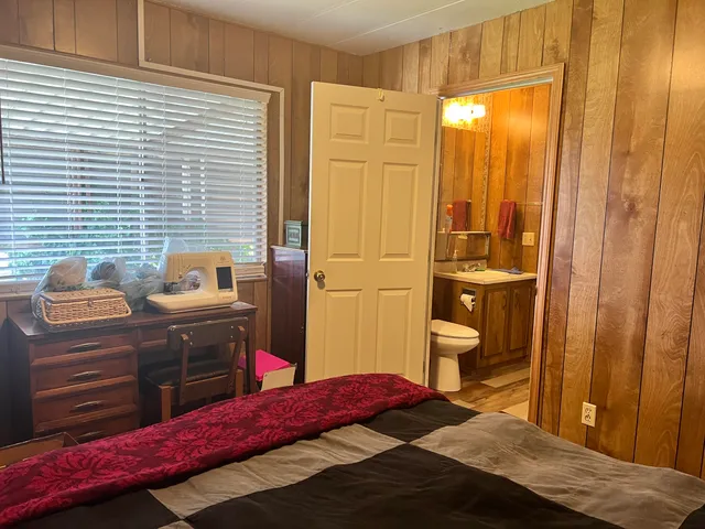 a bathroom with a bathtub and shower