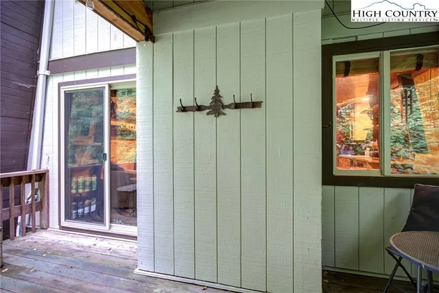 a backyard of a house with outdoor seating